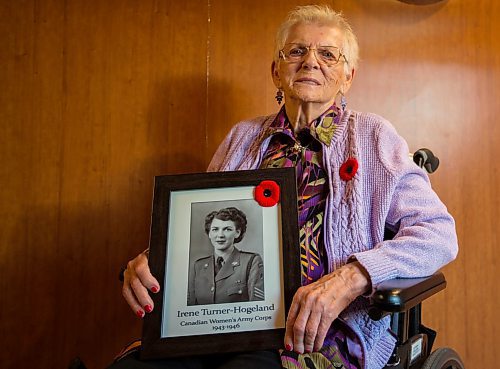 Brandon Sun Canadian Women's Army Corps veteran Irene Hogeland hold a photo of herself in uniform taken during the Second World War at the Dinsdale Personal Care Home Tuesday. (Chelsea Kemp/The Brandon Sun)