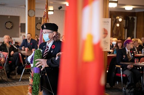 JESSICA LEE / WINNIPEG FREE PRESS

Carol McCall places a wreath at Elmwood Legion on November 11, 2021 during Remembrance Day ceremonies.






