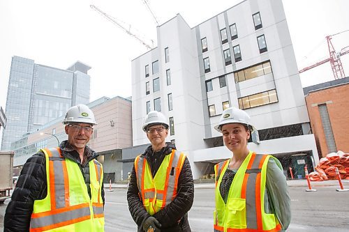 MIKE DEAL / WINNIPEG FREE PRESS
School Director, St&#xe9;phane L&#xe9;onard (left), Practice Leader at Architecture49 Inc., Michael Conway (centre) and School Managing Director, Kate Fennell (right) outside the new building at 225 Edmonton Street.
The RWB student boarding building at 225 Edmonton Street that is under construction replacing the accommodations that were torn down to make way for the completion of True North Square and the new Wawanesa head office. 
see Jen Zoratti story
211110 - Wednesday, November 10, 2021.