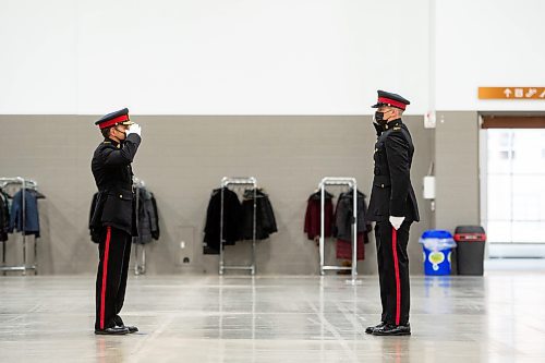 Mike Sudoma / Winnipeg Free Press
Winnipeg police Chief, Danny Smyth, salutes Constable Ryan O&#x2019;Donnell during the RCMP Recruit Class 165 graduation event at the RBC Convention Centre Friday afternoon
November 12, 2021