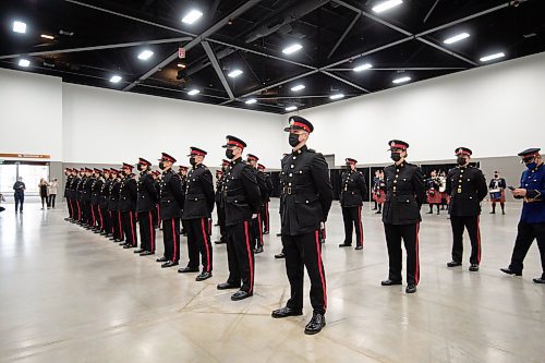 Mike Sudoma / Winnipeg Free Press
Graduates of Winnipeg Police Service Recruit Class # 165 stand in line during their graduation ceremony at the RBC Convention Centre Friday
November 12, 2021
