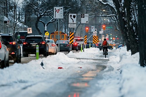 JOHN WOODS / WINNIPEG FREE PRESS
People use the bike paths on McDermott in Winnipeg on Monday, November 15, 2021. 

Re: ?