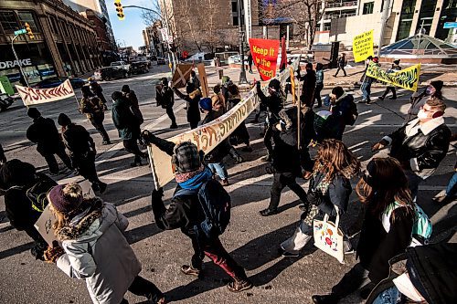 Mike Sudoma / Winnipeg Free Press
&#x201c;All out for WedzinKwa&#x201d; rally participants march down Portage Avenue to the Manitoba Legislative Grounds Friday afternoon
November 19, 2021