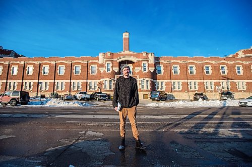 MIKAELA MACKENZIE / WINNIPEG FREE PRESS

Free Press reporter Ryan Thorpe poses for a portrait in front of the Minto Armoury, where Patrik Mathews was at one point stationed, in Winnipeg on Friday, Nov. 19, 2021. For Ryan Thorpe story.
Winnipeg Free Press 2021.