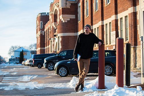 MIKAELA MACKENZIE / WINNIPEG FREE PRESS

Free Press reporter Ryan Thorpe poses for a portrait in front of the Minto Armoury, where Patrik Mathews was at one point stationed, in Winnipeg on Friday, Nov. 19, 2021. For Ryan Thorpe story.
Winnipeg Free Press 2021.