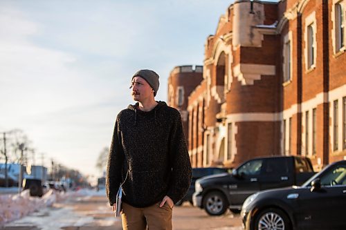 MIKAELA MACKENZIE / WINNIPEG FREE PRESS

Free Press reporter Ryan Thorpe poses for a portrait in front of the Minto Armoury, where Patrik Mathews was at one point stationed, in Winnipeg on Friday, Nov. 19, 2021. For Ryan Thorpe story.
Winnipeg Free Press 2021.