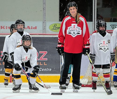 Brandon Sun Olympic gold medallist Megan Mikkelson works with girls at a hockey clinic at Westman Place Saturday morning. The event, co-organized by Scotiabank and Hockey Manitoba, gave local kids a chance to train with some of the country's best. (Colin Corneau/Brandon Sun)