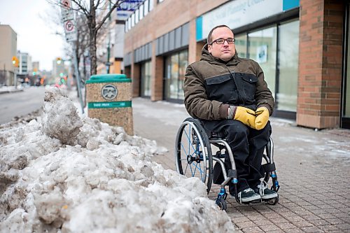 MIKAELA MACKENZIE / WINNIPEG FREE PRESS

Allen Mankewich, who faces challenges with sidewalk snow clearing every year as a wheelchair user, poses for a portrait downtown in Winnipeg on Monday, Nov. 22, 2021. For Joyanne story.
Winnipeg Free Press 2021.