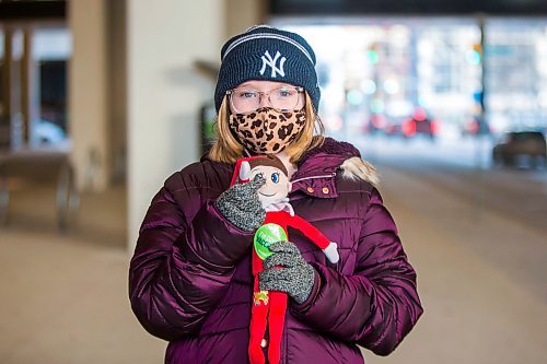 MIKAELA MACKENZIE / WINNIPEG FREE PRESS

Charlee Wolfe (nine) poses for a portrait with Elfy in front of the RBC Convention Centre vaccination supersite after getting vaccinated in Winnipeg on Wednesday, Nov. 24, 2021. For --- story.
Winnipeg Free Press 2021.