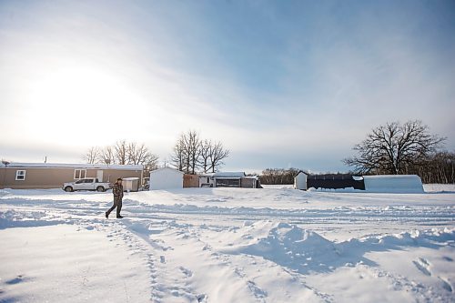 MIKAELA MACKENZIE / WINNIPEG FREE PRESS

Joe Belchior walks past his pigeon loft on his property near Woodlands, Manitoba on Saturday, Nov. 20, 2021. For Ben Waldman story.
Winnipeg Free Press 2021.