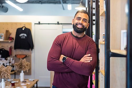 MIKAELA MACKENZIE / WINNIPEG FREE PRESS

Obby Khan, co-founder of GoodLocal, poses for a portrait in the new storefront in the Exchange District in Winnipeg on Tuesday, Nov. 30, 2021. For Gabby story.
Winnipeg Free Press 2021.