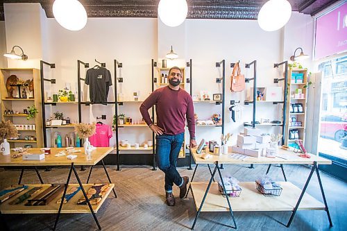 MIKAELA MACKENZIE / WINNIPEG FREE PRESS

Obby Khan, co-founder of GoodLocal, poses for a portrait in the new storefront in the Exchange District in Winnipeg on Tuesday, Nov. 30, 2021. For Gabby story.
Winnipeg Free Press 2021.