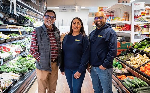 JESSICA LEE / WINNIPEG FREE PRESS

Dinu Tailor (right), owner of Dino&#x2019;s Grocery Mart, is photographed at his store with daughter Neeti Varma and son-in-law Rajan Varma on November 30, 2021.

Reporter: Dave












