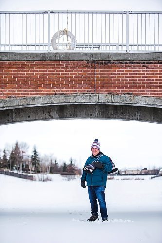 MIKAELA MACKENZIE / WINNIPEG FREE PRESS

Skating enthusiast Kerry Stevenson poses for a portrait on a pond near his house in Winnipeg on Wednesday, Dec. 1, 2021. For --- story.
Winnipeg Free Press 2021.