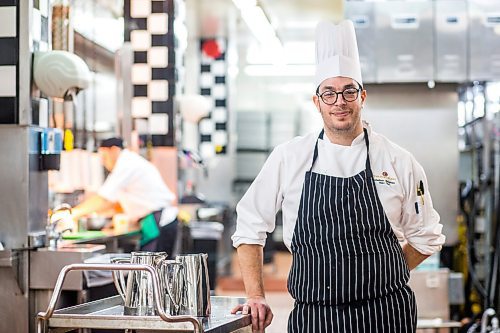 MIKAELA MACKENZIE / WINNIPEG FREE PRESS

Oval Room chef de cuisine Mathieu  Bellemare poses for a portrait in the kitchens at the Fort Garry Hotel in Winnipeg on Wednesday, Dec. 1, 2021. For Ben Sigurdson story.
Winnipeg Free Press 2021.