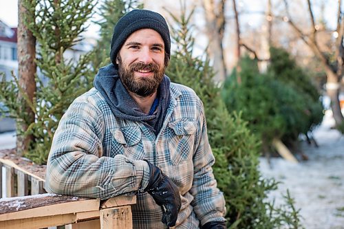 MIKAELA MACKENZIE / WINNIPEG FREE PRESS

Robin Bryan poses for a portrait with Christmas trees at Pete's Trees in Winnipeg on Friday, Dec. 3, 2021. For Martin Cash story.
Winnipeg Free Press 2021.