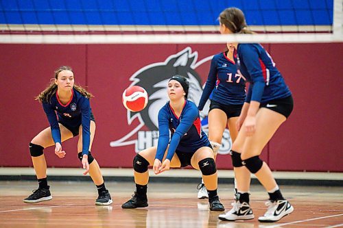 Daniel Crump / Winnipeg Free Press. St. Mary&#x573; Flames left side Aleana Stevens digs for the ball during the AAAA Provincial High School Girl&#x573; Volleyball championships between against the JH Bruns Broncos at Sturgeon Heights Collegiate in Winnipeg, Saturday evening. December 4, 2021.