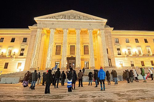 Mike Sudoma / Winnipeg Free Press
A small crowd gathers at the Manitoba Legislative building Monday evening to take part in the Rally for Remembrance, to raise awareness of gender based violence and to remember those lost to gender based violence.
December 6, 2021 