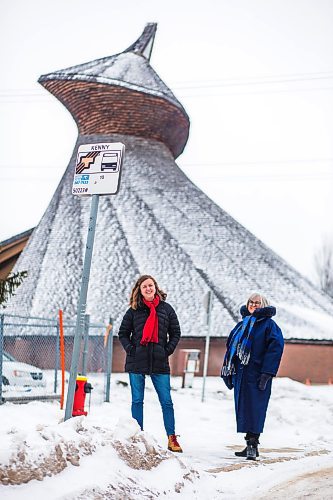 MIKAELA MACKENZIE / WINNIPEG FREE PRESS

Julie Penner, audio producer, and Susan Algie, executive director of the Winnipeg Architecture Foundation, pose for a portrait at a #10 bus stop in front of Precious Blood church in Winnipeg on Wednesday, Dec. 8, 2021. The two worked on Archi10, a new app that delivers an audio tour of local buildings while travelling along the #10 bus route. For Eva story.
Winnipeg Free Press 2021.