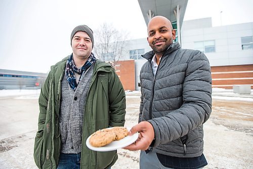 MIKAELA MACKENZIE / WINNIPEG FREE PRESS

Dylan MacKay (left) and Dr. Sijo Joseph pose for a portrait with some of the cookies in the study in front of the Richardson Centre for Functional Foods and Nutraceuticals in Winnipeg on Wednesday, Dec. 8, 2021. They are conducting a nutritional study using breakfast cookies made from oats containing beta-glucan, and will be looking at whether beta-glucan from oats has any effect on blood pressure. For Sabrina story.
Winnipeg Free Press 2021.