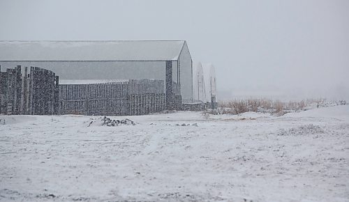 MIKE DEAL / WINNIPEG FREE PRESS
Structures on the Birkland Farms Ltd property which is south of Winkler, MB, close to the U.S. border.
211208 - Wednesday, December 08, 2021.