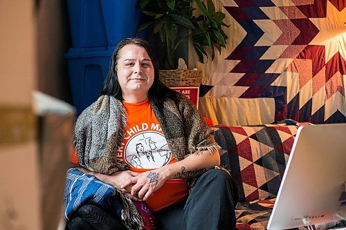 MIKAELA MACKENZIE / WINNIPEG FREE PRESS

Alaya McIvor poses for a portrait at her work station where she's been answering calls around the clock for a donation drive for residential school survivors in Winnipeg on Thursday, Dec. 9, 2021. For Tyler story.
Winnipeg Free Press 2021.