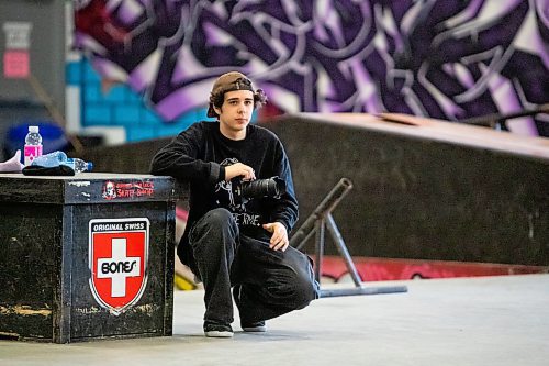 Daniel Crump / Winnipeg Free Press. Jackson Toone, creator of the Don&#x574; Waste Time skateboarding zine, takes photos during the launch party of the latest issue of his zine at The Edge Skatepark in downtown Winnipeg on Saturday. December 11, 2021.