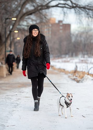 Mike Sudoma / Winnipeg Free Press
Ricki Bates and her pup Ruka enjoy a walk along the river trail by the Manitoba Legislature grounds Monday afternoon
December 13, 2021 