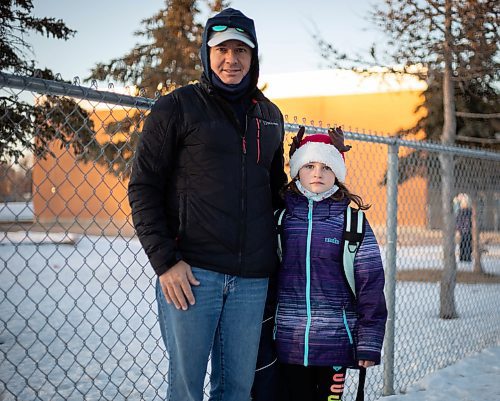 JESSICA LEE / WINNIPEG FREE PRESS

Andre Martel and his grade 2 daughter Charlotte are photographed outside &#xc9;cole Dieppe on December 14, 2021.

Reporter: Maggie










