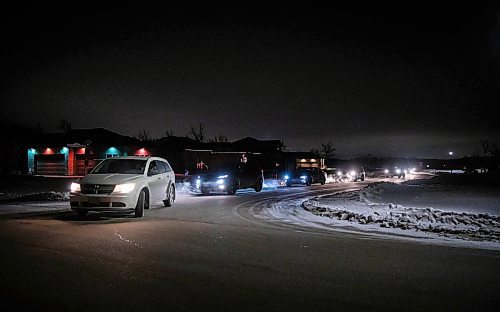 JESSICA LEE / WINNIPEG FREE PRESS

Cars pass the street that Dr. Brent Roussin allegedly lives on in Headingley, Manitoba, while honking their horns on December 16, 2021. The group intend to send a message to Roussin and other politicians, saying that they are watching them and won&#x2019;t be told what to do.












