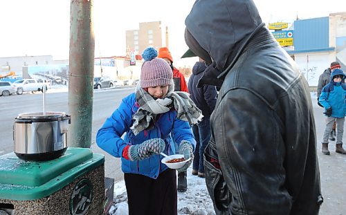 RUTH BONNEVILLE / WINNIPEG FREE PRESS

 Standup - Youth Outreach

Heidi Barry serves hot chili to people at a bus stop on Main Street as part of her church's youth outreach program Saturday afternoon.  



Dec 18th,  2021
