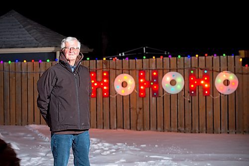 Mike Sudoma / Winnipeg Free Press
Sid Farmer shows off his &#x201c;Hohoho light display which are a contrast to his father Sid&#x2019;s, infamous &#x201c;Humbug&#x201d; light display which shines bright from his former apartment&#x2019;s balcony which faces the Route 90 underpass near Polo Park
December 20, 2021 