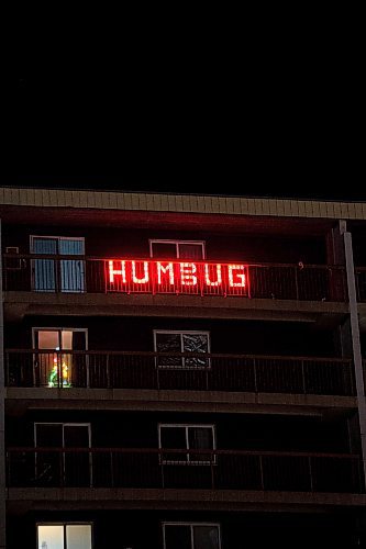 Mike Sudoma / Winnipeg Free Press
Sidney (Sid) Farmer&#x2019;s infamous &#x201c;Humbug&#x201d; light display which shines bright from his former apartment&#x2019;s balcony which faces the Route 90 underpass near Polo Park
December 20, 2021 