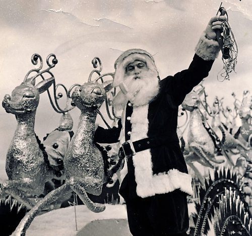 1954--- With a merry ho ho ho and a joyful jingling of bells, Santa Claus came to town Saturday, morning.&#xa4; Here is the jolly old fellow as he was greeted by thousands of happy children and adults who saw him in the big Eaton&#x2019;s parade. winnipeg free press Picture ran Nov 20, 1954.