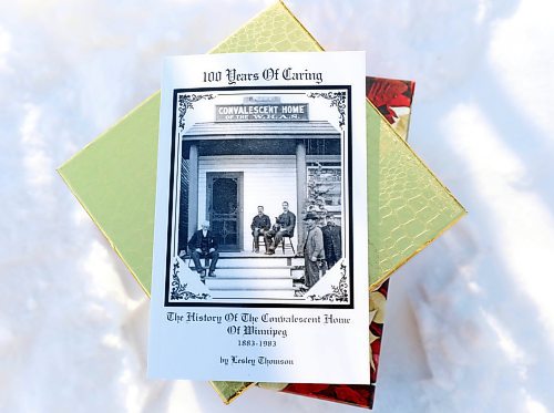 RUTH BONNEVILLE / WINNIPEG FREE PRESS
 
Local - Convalescent Home of Winnipeg

Photo of the cover of a book documenting the history of the Convalescent Home of Winnipeg. 

For Christmas feature on how this PCH is adapting to their second pandemic Christmas.

Dec 22nd,  2021
