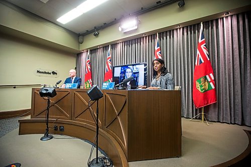 MIKAELA MACKENZIE / WINNIPEG FREE PRESS

Health minister Audrey Gordon (right) and chief provincial public health officer Dr. Brent Roussin speak at a press conference asking the public to adjust their holiday plans at the Manitoba Legislative Building in Winnipeg on Friday, Dec. 24, 2021.  For Malak story.
Winnipeg Free Press 2021.