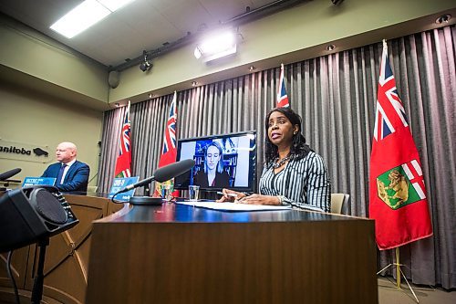 MIKAELA MACKENZIE / WINNIPEG FREE PRESS

Health minister Audrey Gordon (right) and chief provincial public health officer Dr. Brent Roussin speak at a press conference asking the public to adjust their holiday plans at the Manitoba Legislative Building in Winnipeg on Friday, Dec. 24, 2021.  For Malak story.
Winnipeg Free Press 2021.