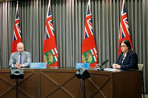 JOHN WOODS / WINNIPEG FREE PRESS
Dr. Brent Roussin, Manitoba chief public health officer, and premier Heather Stefanson speak during the province's latest COVID-19 update at the Manitoba legislature in Winnipeg Monday, December 27, 2020.  

Re: ?