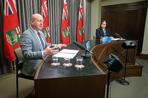 JOHN WOODS / WINNIPEG FREE PRESS
Dr. Brent Roussin, Manitoba chief public health officer, and premier Heather Stefanson speak during the province's latest COVID-19 update at the Manitoba legislature in Winnipeg Monday, December 27, 2020.  

Re: ?