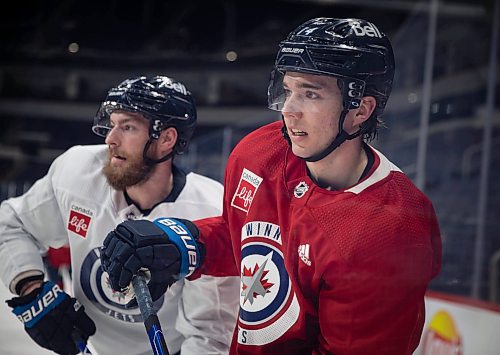 JESSICA LEE / WINNIPEG FREE PRESS

Players Pierre-Luc Dubois (left) and Ville Heinola are photographed at practice on December 28, 2021.








