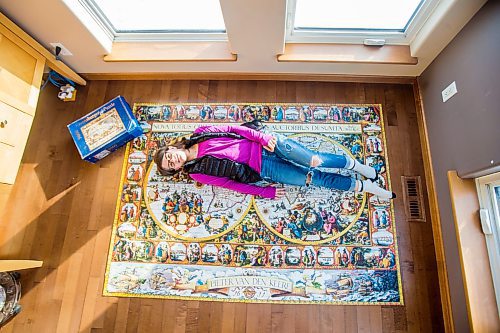 MIKAELA MACKENZIE / WINNIPEG FREE PRESS

Alexa Storozuk, 13, poses for a portrait with her completed 9,000 piece puzzle in her home in West St. Paul on Thursday, Dec. 30, 2021. For Bryce Hunt story.
Winnipeg Free Press 2021.