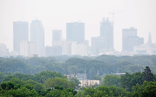 MIKE DEAL / WINNIPEG FREE PRESS

Smoke from forest fires east of Berens River and west of Red Lake hang over downtown Winnipeg Tuesday afternoon.

210706 - Tuesday, July 06, 2021.