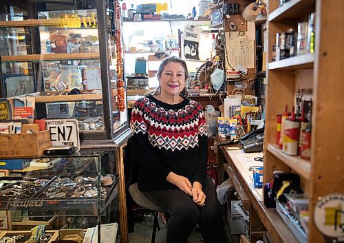 JESSICA LEE / WINNIPEG FREE PRESS

Barb Huen of Mike&#x2019;s General Store is photographed sitting behind the cash at her store on December 30th, 2021.

Reporter: Gabby









