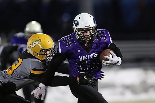 Nolan Bower carries the ball during the Vincent Massey Vikings 31-23 win over the Steinbach Sabres in the Winnipeg High School Football League's Westman Bowl at the East Side Eagles Field in Winnipeg on Thursday. (Thomas Friesen/The Brandon Sun)