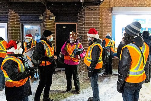 Brandon Bear Clan volunteers celebrate their 500th patrol Thursday with a visit to the Blue Door Project. (Chelsea Kemp/The Brandon Sun)