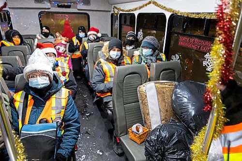 Brandon Bear Clan volunteers celebrate their 500th patrol Thursday set out to deliver Christmas gifts in the Wheat City. (Chelsea Kemp/The Brandon Sun)