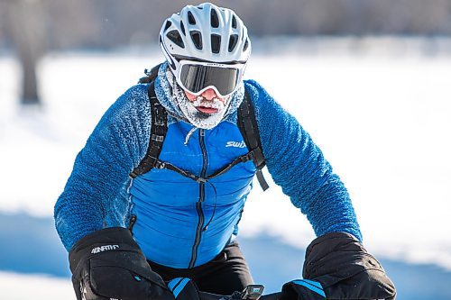 Daniel Crump / Winnipeg Free Press. Dillan Pearse rides a fat tire bike in Assiniboine Park in Winnipeg on New Years Day, braving temperatures around -40C with windchill. January 1, 2022.
