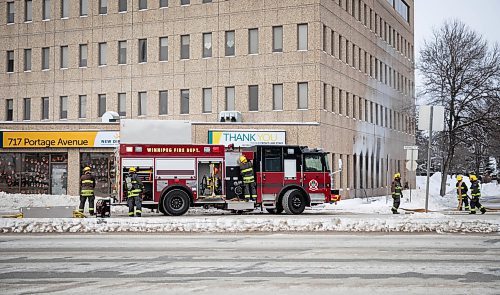 JESSICA LEE / WINNIPEG FREE PRESS

Fire fighters are photographed exiting the New Directions building at 717 Portage Avenue after putting out a fire that occurred there earlier in the day on January 3, 2022.









