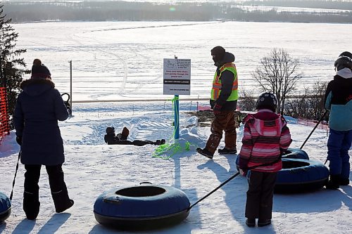 03012021
Tubers wait to race down the hill at Tubin' at Grand Valley Park on a crisp Monday afternoon. (Tim Smith/The Brandon Sun)