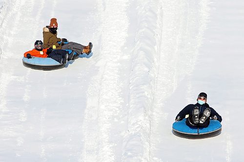 03012021
Bundled up sledders race down the tubing track at Tubin' at Grand Valley Park on a crisp Monday afternoon. (Tim Smith/The Brandon Sun)